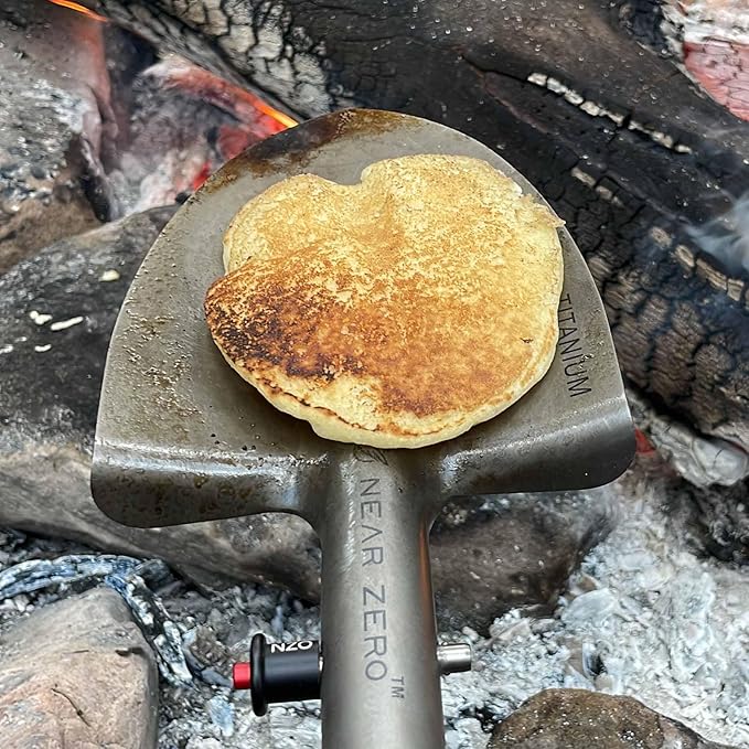 Near Zero Titanium Survival Shovel - Compact, Lightweight, & Collapsible Tactical Tool, Ideal for Backpacking, Camping, & Hiking, Sharpened Edge for Chopping Wood, Doubles as Frying Pan