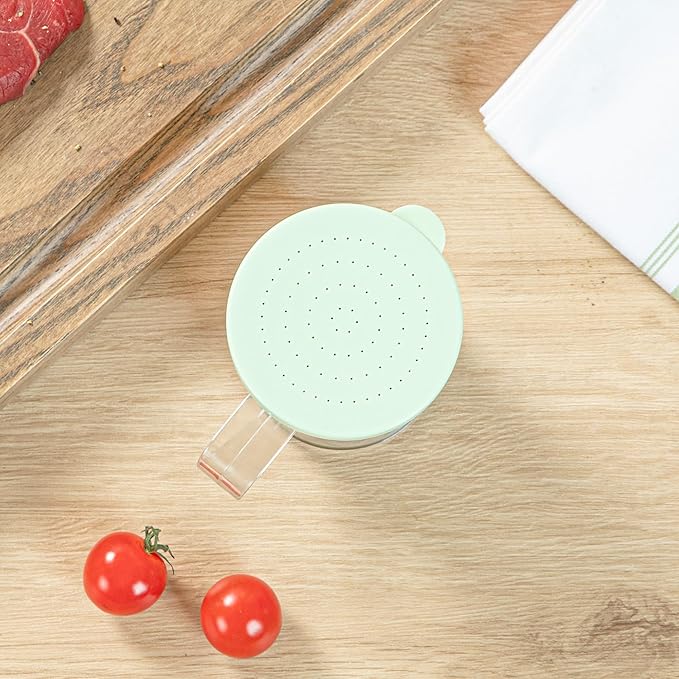 Restaurantware RW Base 10 Ounce Clear Plastic Dredge Spice Shaker 1 Reusable Dry Rub Shaker - Includes Green Perforated Lid With Handle Clear Polycarbonate Spice Shaker For Fine Seasonings